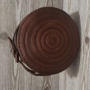 Round embossed brown handmade crossbody bag